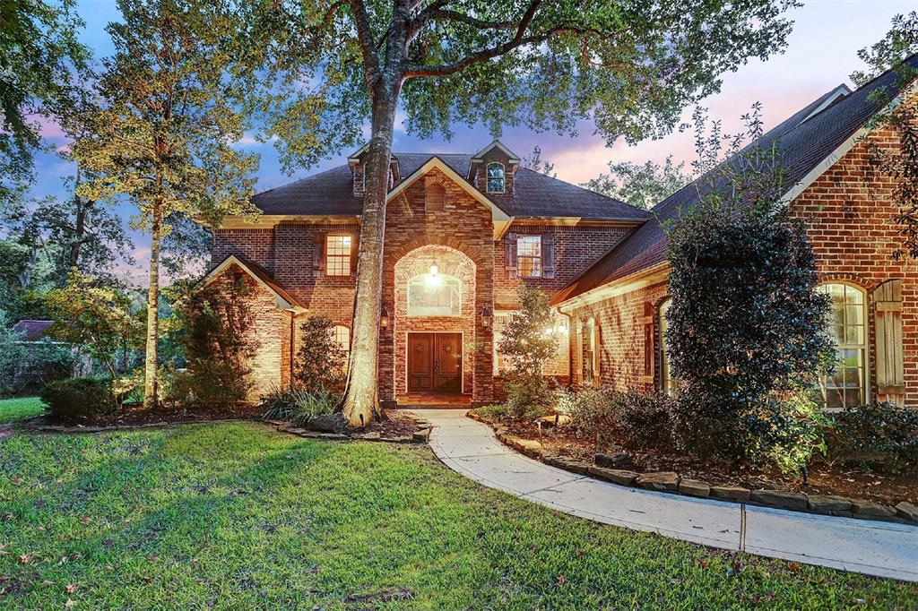 36911 Edgewater Pinehurst, Texas This waterfront estate on 10(+/-) acres in the exclusive, gated community of Old Mill Lake boasts a luxurious lifestyle with the amenities of a country retreat w/custom details around every corner creating a personal haven in an unmatched breathtaking setting. Natural woodland provides the ideal sportsman location for hiking and off-road vehicles. The owner's retreat is a true haven that invites you to relax and unwind w/the beautiful marble-clad bathroom. The estate was designed w/the finest amenities for entertainment, relaxation & renewal making hosting gatherings effortless. Whether it’s the spacious gameroom or media room, or the wine grotto off the butler’s pantry, the options are endless. The resort-like oasis was also designed with relaxation in mind and features an expansive covered patio with w/outdoor fireplace & kitchen; and a separate building w/480 sq. ft. office & workshop. Swim in the resort style Pool or cozy up next to the fire pit. Easy access via Aggie Expressway.
