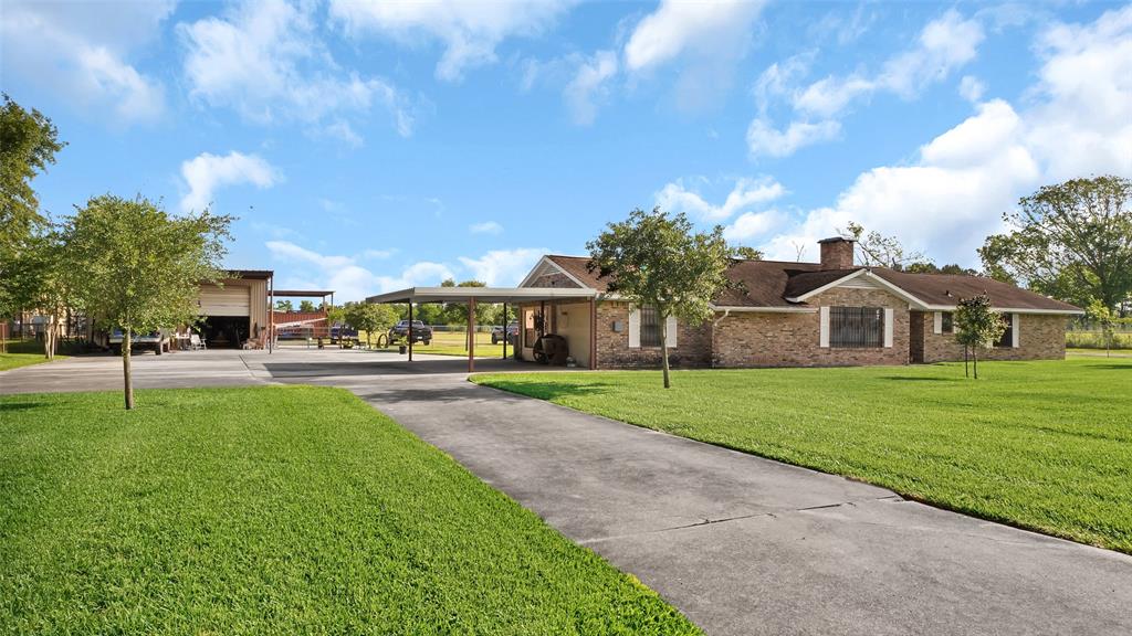 1133 Church Street Street Crosby, Texas Property has NEVER FLOODED! This stunning home sits on almost 5 acres. Inside the home you will find a gorgeous island kitchen with granite counter tops and wooden cabinets. Master bedroom has vanity area inside the room. Tile all throughout the house. Granite counter tops in all restrooms. Huge garage detached for tool storage. Fully fenced.