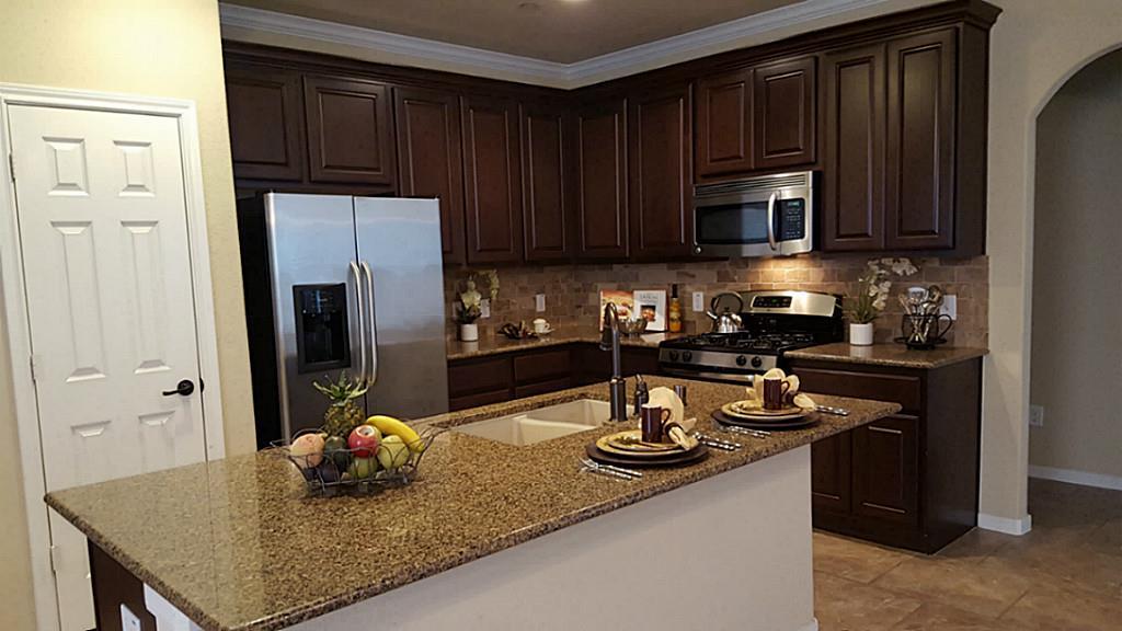 18 Umbria The Woodlands, Texas Gorgeous Town Home with Many Nice Appointments. 3 Bedrooms, Game Room, Study with Hardwood Floor, 2.5 Baths, 2 Car Garage, Open Floor Plan with Breakfast Bar in Granite Island Kitchen with Stainless Appliances including Side by Side Fridge. Washer and Dryer Included as well! Tile in Wet Areas, Neutral Colors, Granite Countertops in Both Full Baths, Kohler Sinks, Ceiling Fans in all rooms, Game Room Up. Great Location on End Unit. One Block from Exemplary Elementary. Private Rear Entry to Garage. Master Planned Community with many parks and walking trails to access.