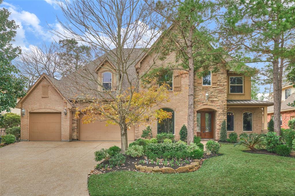 95 S Seasons Trace The Woodlands, Texas TURN-KEY Meadowlark custom is ready for immediate move-in! Situated on private lot w/lush green space in desirable Seasons Trace neighborhood, featuring NEW roof 12/20, new carpet, '20 water heaters & dishwasher, recent microwave + BBQ grill! Open-concept floor plan w/towering great rm off gourmet kitchen w/built-in fridge, Thermador appls/dbl ovens, wood encased vent hood, butlers pantry, 2-story great rm w/beamed ceiling, planning/mud rm, paneled study w/alcove! Secluded owners retreat w/updated bath, seamless shwr, his/her vanities, huge game rm up w/wainscoting, Juliet balcony & built-ins, spacious en-suite secondary BR's, 2nd half bath & massive TX basement/optional build-out for addtl living area! Sparkling saltwater pool & spa, lounge area, outdoor gas firepit, summer kit, surround sound, mature landscaping & no neighbors behind! Great landscape lighting, 3-car epoxy garage floor + amazing built-ins, central vac! Zoned to exemplary schools, nearby park, low tax rate,high & dry!