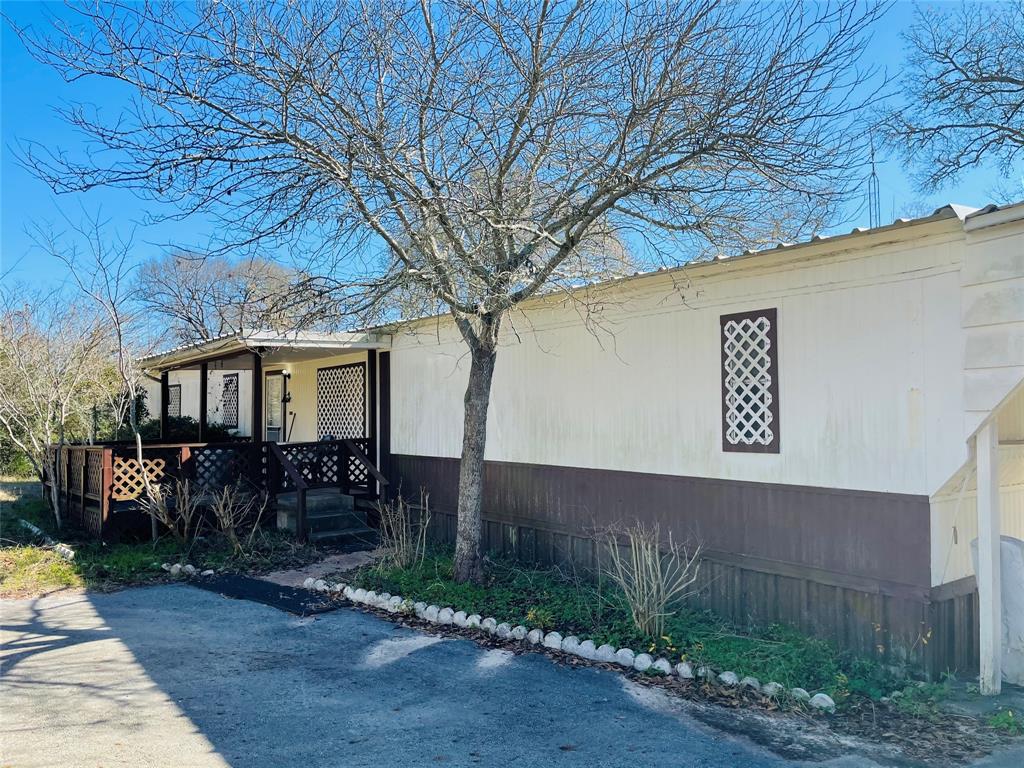 1134 County Road 130 Centerville, Texas Centerville TX 4 BED 2 BATH Home on 8+/-AC
Great location being just East of Centerville on a nice and quiet dead end road ( NEAR CENTER RANCH ). This Property has an older mobile home that has had additional bedrooms and living spaces added to accommodate. The house is in livable condition but could use a little updating making it great for a handy man project.
There are several out buildings on the property that are wired and would be good for storage. A deep water well is the water supply to this place giving it ample water availability for gardening and other projects. The House and buildings are tucked back in the trees and is lead up by a nice blacktop driveway.
Deer and other wildlife are in the area as this place is partially cleared up front and has dense woods in the back.
Great place to get away to or be used as a future homesite.
