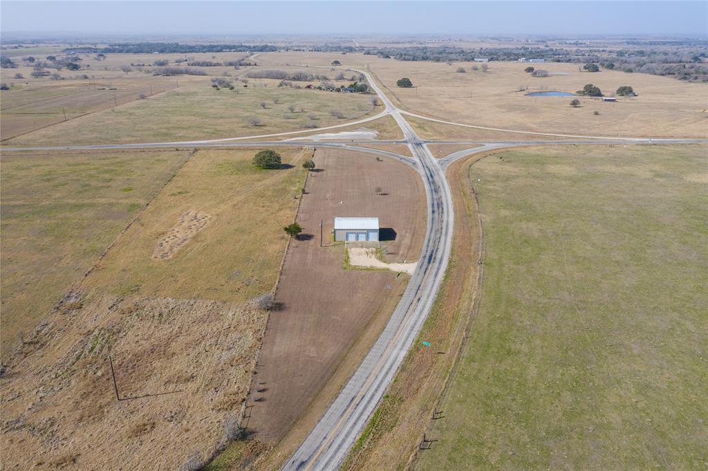 10273 Fm 532 Hallettsville, Texas Looking for the perfect country getaway? This wonderful Barndominium was built in 2007 and is perfectly situated on a little less than two acres of land. This home features one bedroom, full kitchen and full bath with laundry connections with the ability to add additional living space on the second floor. The home has an oversized garage with electrical, sewer and water for you or your friend's RV or Travel Trailer. With easy access to San Antonio, Houston, Austin and Victoria this is the perfect place to escape from the hustle and bustle.