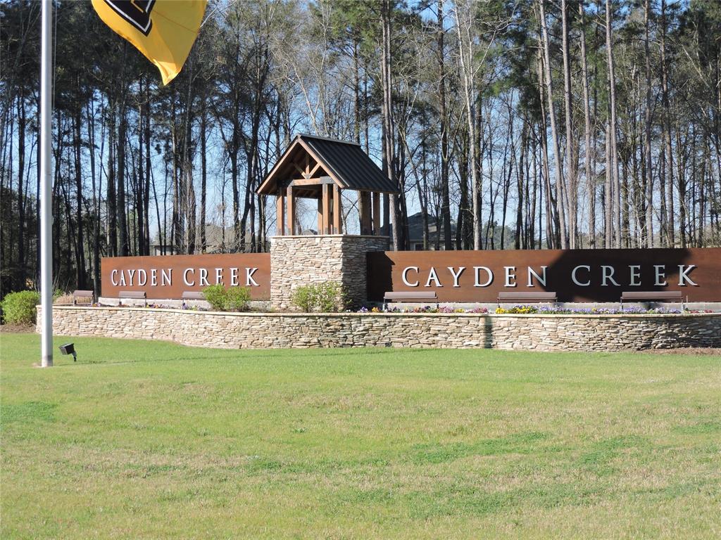 1162 Swinford Court Conroe, Texas Come Home to the relaxed living at Cayden Creek in Conroe. Enjoy a convenient commute to the Woodlands and downtown Houston with easy access to I-45, Hardy and The Grand Pkwy. Community is close to Lake Conroe, Conroe YMCA, Shopping and Medical. This home features 5 bedrooms, 3.5 Baths with open living floorplan. Large Game Room upstairs, Lots of storage, Granite counters, stainless appliances including refrigerator with gas cook-top. Large master suite downstairs, this home also features a junior suite or second master upstairs, tile and carpet flooring throughout home, private covered patio and large fenced backyard. Welcome Home!