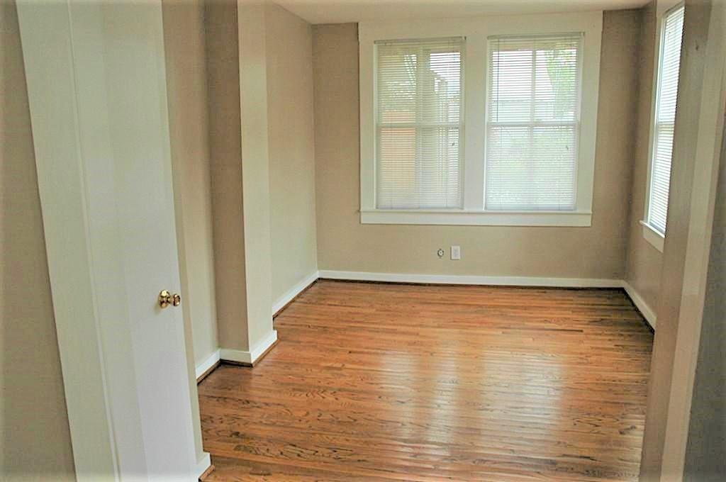 This extra room is across from the open kitchen and in the past has been used as a dining room, office, second living area and guest space.
