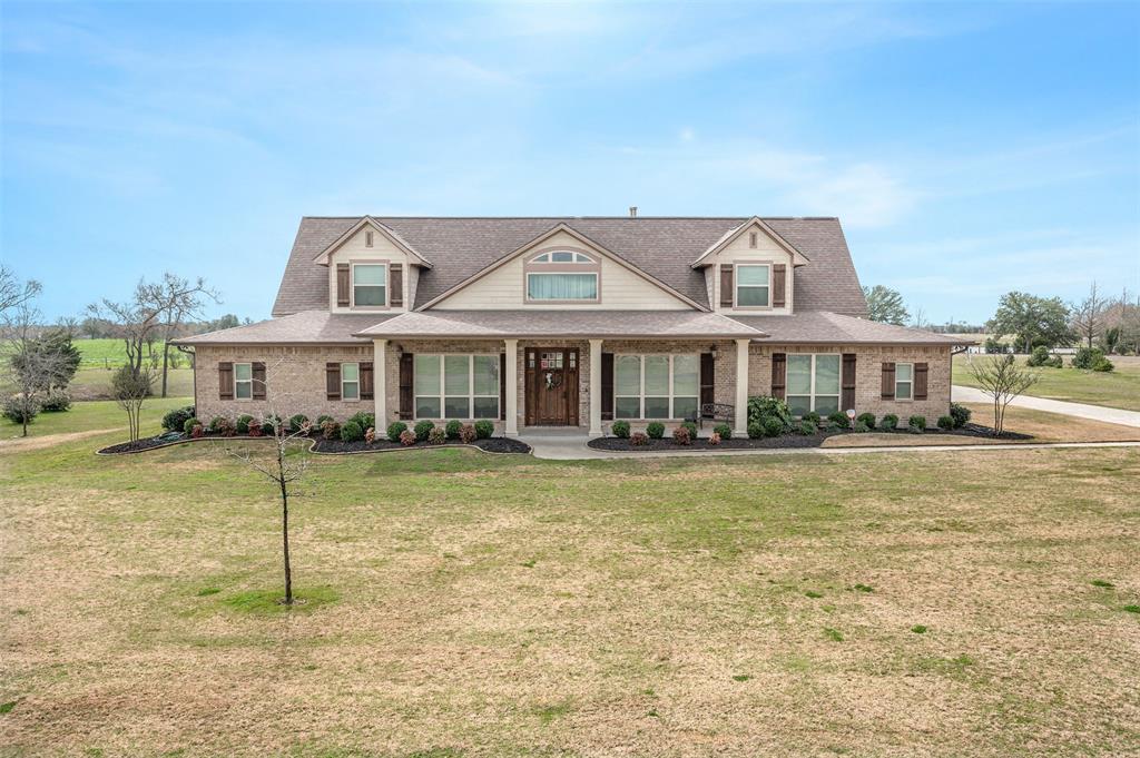 7300 Limestone Court Bryan, Texas Beautiful 4BR/4.5BA custom home situated on 1.7 acre lot in Stone Creek Farms. Warm and inviting, this home is abundant with natural light and custom touches throughout. Kitchen features oversized island, Thermador commercial grade gas range, walk in pantry, breakfast area and granite counter tops. Formal dining room. Primary bedroom suite has picture window views of the backyard, separate oversized shower and tub. Separate study. Amazing multi-use room laundry room, currently being used as a craft room, has loads of storage, freezer space and a sink. Enjoy the views of the swimming pool and garden area from your screened in back porch. Equipped with energy saving solar panels.