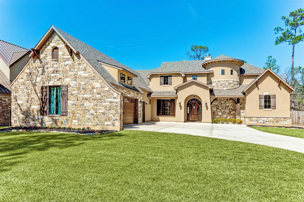 28015 Summerton Drive Spring, Texas Inspired by a Scottish Castle complete with turret.Old World Transitional style reflected in the dark wood of the flooring, beams, and mantle.The lighting mimics old time candle lit fixtures, which adds to the feel. Thermador Chef’s kitchen includes convection ovens for baking, rotisserie, pizza. WiFi enabled.
Gas top with 6 burners,apron sink, granite breakfast bar. Butlers pantry leads to dining room.
Expansive family room centered 25’ tall stone fireplace. Wine room and study both off the fam rm. Glass sliders fold back to open to outdoors. Covered patio has 2 ceiling fans, grill, sunning area, steps down to pool and spa. Pool has rocks, water fall, and water features.
Soaring ceilings, beams throughout lower rooms. 4bedrooms each with en-suite bath. One powder bath down.
Master BR and bath down. Bath has 2 sinks, huge shower with seating. His and hers closets. Hers has Vanity table and chandelier. Hidden Panic room with reinforced walls.
Generator. Welcome home!