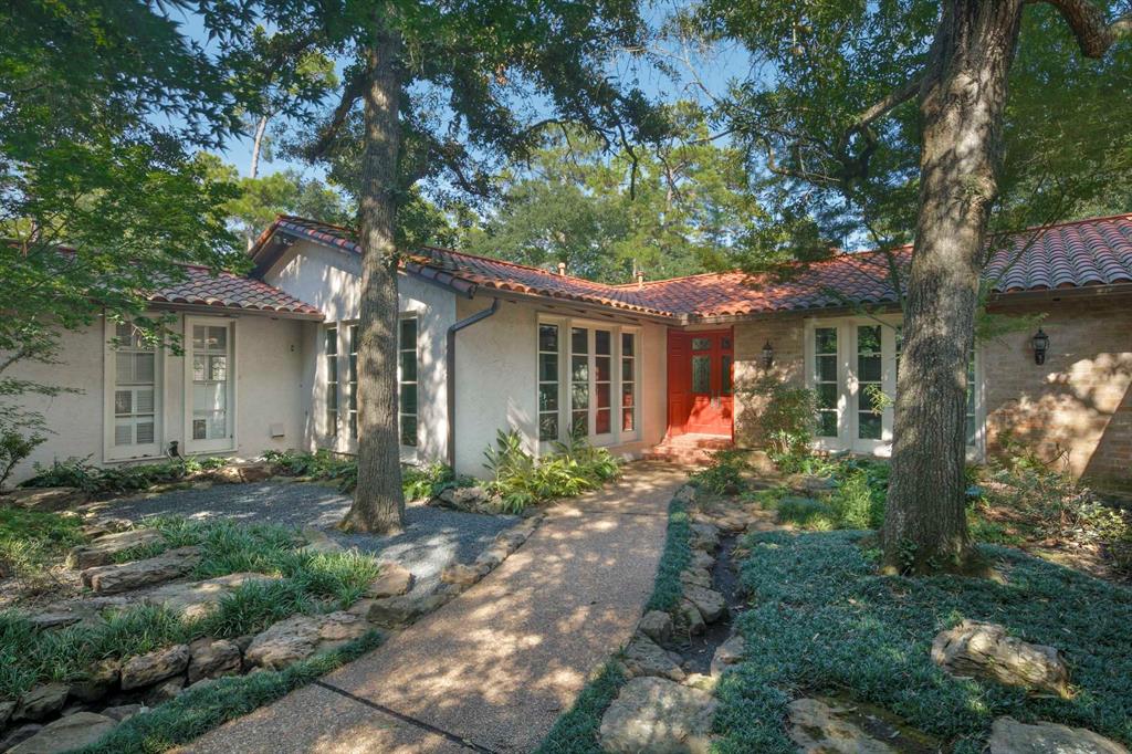 Spanish style ranch home on rare 1.55 acre lot in exclusive close in Memorial village neighborhood of Hunter's Creek. Extremely well-located, the house is minutes from The Houston Racquet Club, The Houston Country Club, The Forest Club and The Houstonian.

Perfectly suited, and zoned for the Spring Branch Independent School District, the custom built 6,285 square foot house includes 5 bedrooms, four and a half baths and a maid's quarters with separate entrance (an expansion plan is included for buyers interested in increasing the footprint of the house).  The house offers a large utility room, Garden Room, formal library, dramatic Fortuny clad dining room, and a separate sunken living room with floor to ceiling French doors looking out onto a 50 foot heated swimming pool.
