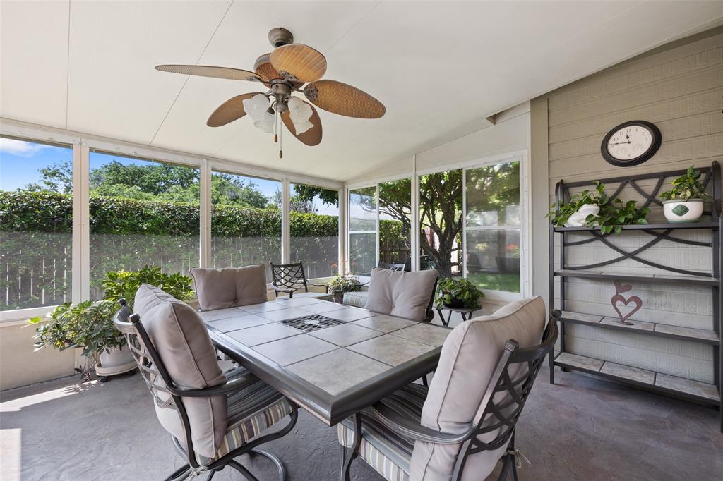 This unique outdoor room directly off the kitchen adds a third living space to the home, a brilliant addition by the sellers.  All of the windows have screens, and the windows themselves are rated to withstand 75 mph wind.  Use it as your 