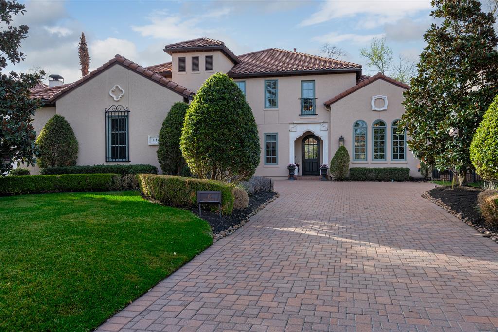 19 Camelot Oaks Court The Woodlands, Texas Gorgeous Mediterranean Villa backing onto the 2nd fairway of the exclusive Gary Player golf course in Sterling Ridge. You will immediately fall in love with this immaculately maintained home situated on a quiet and private cul-de-sac in one of the most unique neighborhoods in The Woodlands. Amazing floor plan has large private study, open & spacious kitchen, game room, media room and true 3 car garage. From the tile roof, Wolf & Sub-Zero appliances, Mosquito Misting system, tankless water heaters, surround sound & beautiful hand scrapped wood floors throughout, this home provides living at it finest. Amazing views of the golf course and back yard oasis can be seen through the expansive windows along the back side of the home. Enjoy this breathtaking outdoor space all year in the natural stone & Pebble Tec pool or covered patio in the summer and the hot tub or around the gas fire pit in the winter. Quick access to everything without traffic noise, schedule your showing today!
