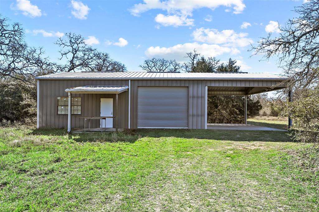 000000 Shaws Bend Rd Columbus, Texas Hard to find large acreage in a very desirable area that has it all. Mixture of woods, meadows and several ponds throughout the property. A recent 1200 sf metal building shell that is plumbed for a well and septic system, it does have electricity, and a large carport area and looks out over one of the many ponds. Several years ago, one of the neighbors lowered their high fence so it is not unusual to see exotics, most commonly elk. There are hogs and whitetail, in fact we have never been on this property without seeing deer. There is a good gravel road from the entrance to the metal building, there is surface gravel on the property and the landowner uses it to build roads making it very reasonable to add roads wherever you decide. From this property it is right under an hour to Katy, 25 minutes to Round Top, and 1.25 hours to Austin. Very centrally located for all of your friends and family to meet you in the country. You will enjoy the big oaks and the peace and quiet!