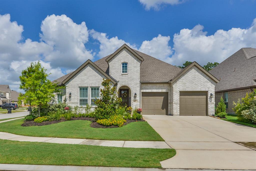 28226 Briarwood Pass Spring, Texas Absolutely stunning Toll Brothers Draper floor plan 1 story. Includes 4 spacious bedrooms, a great room perfect for entertaining, a media or game room for whatever best suites your needs. Kitchen features quartz counter-tops, white cabinets, stainless steel appliances, large island, gas cooktop, butlers pantry and fantastic walk-in pantry. Beautiful wood floors throughout great room, kitchen, dining, entry and study. High ceiling & tons of natural light. Plantation shutters on front windows. 3 car tandem garage. Spacious back-yard and side yard. French doors on study & new custom built-ins. Woodson's reserve is a forested and tranquil community with tons of amenities including pool, splash pad, dog park, play ground, 24 hour fitness room, lakes for catch and release, walking distance to tennis courts and intermediate school and miles of nature trails! Commuting is a breeze, conveniently located to 99/I-45/Exxon Campus.