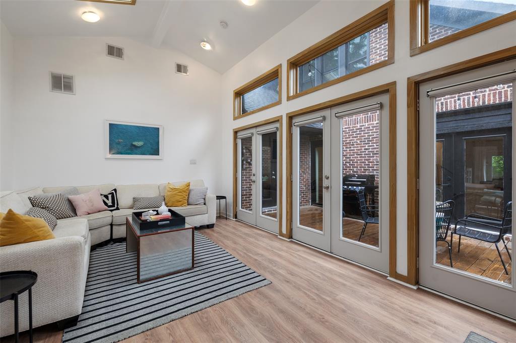 Located across the back patio, you will find this huge flex space. This large open room offers tons of natural light and offers you tons of options, including a home gym, home office, or a second living space.