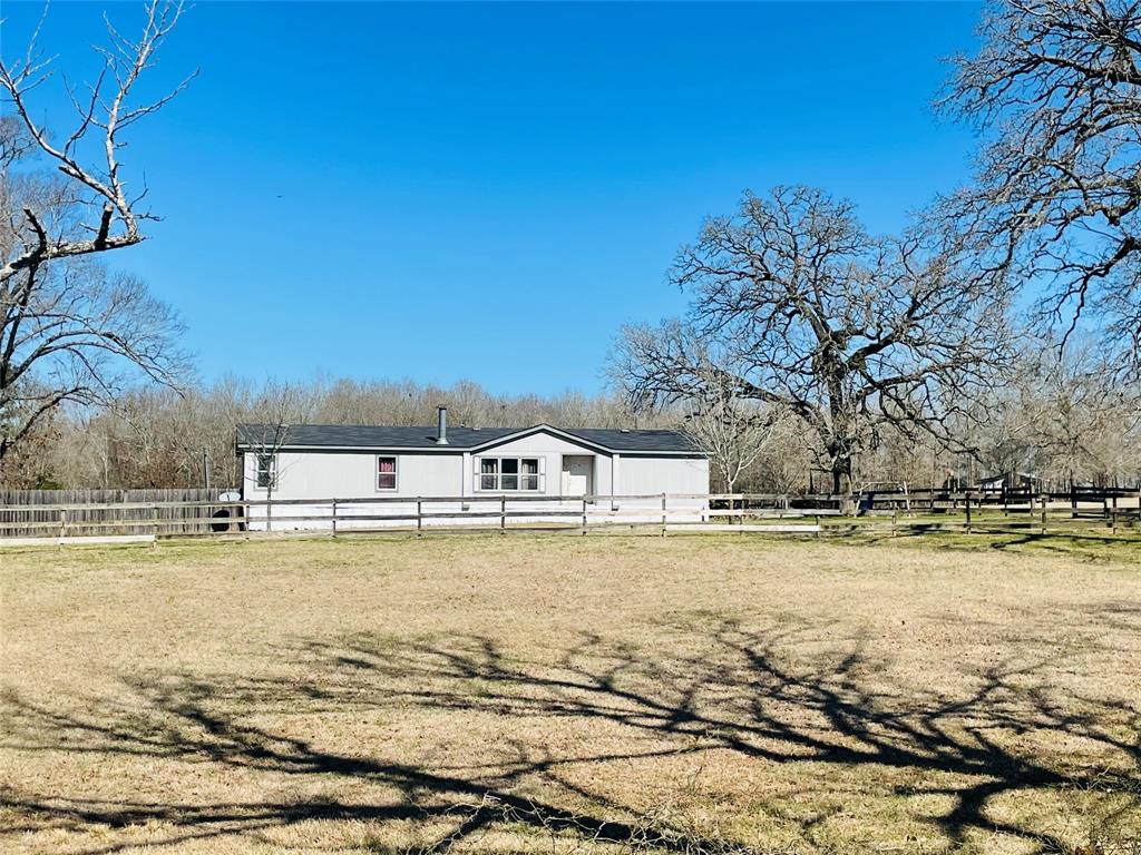 15167 State Highway 7 Centerville, Texas Centerville 4 BED 2 BATH Home on 10+/-AC
Great Location being East of Centerville with easy access having HWY 7 and Private Road frontage.
This Place has a well manicured Pasture with a nice pond making it ideal for a person wanting a home on a small farm. The Home is very spacious with an open concept giving plenty of room to accommodate friends and family.
A back porch is stretched across the entire back of the home making a prefect spot to sit back and over look the pond and pasture.