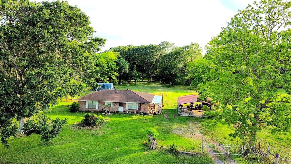 20702 Highway 36 Guy, Texas Beautiful country property right on Highway 36 with mature trees has a functioning 2 bedroom/2 bathroom home with water well and gravity fed septic system and sits just outside of Needville inside the city of Guy. Sold AS IS. Has plenty of room to build a custom of home in the back of property while maintaining the beautiful mature trees. This property is a diamond in the rough which allows you to live the country life, with no deed restrictions, and still keep you close enough to get to major highways.