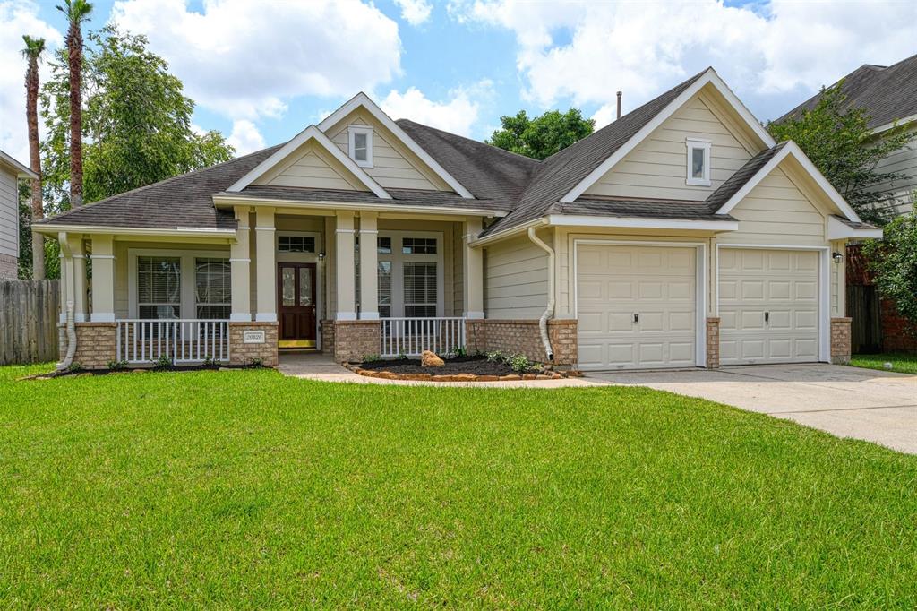 20826 Meadowhill Drive Spring, Texas Adorable Single Story Home with Porch. This home features 3 Bedroom, 2 Bathrooms, Study, Formal Living Room and Dining Room, Kitchen with Breakfast area, Family Room with Gas Log Fireplace. Kitchen has Stainless Appliances, GE Gas Range, GE Microwave, LG Refrigerator with Ice Maker as of May 2021. It has a Whirlpool Stainless Dishwasher. This home has no carpeting. Floors were replaced with wood looking tile May 2021. The home was repainted on the inside as well as the outside May 2021. Bathroom counters were replaced May 2021. The home has a sprinkler system for both the front/backyard. The backyard is fully fenced. The home is close to the neighborhood pool and a short walk to Kreinhop Elementary School. Convenient to I-45 and 99. Yard Care is Included. No Smoking, Pets Case By Case, 1 dog 20lbs. or under.