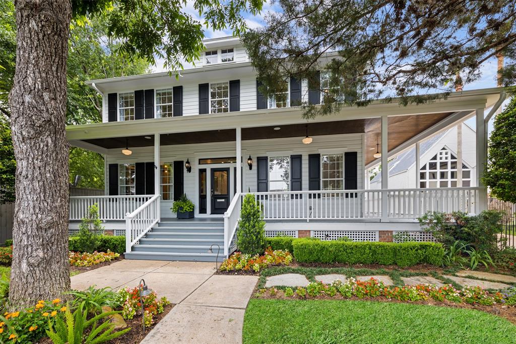 You and your guests will love walking up the front steps to the gorgeous porch. The landscaping was professionally designed and pops with color. A sprinkler system is installed throughout the front and back yards.
