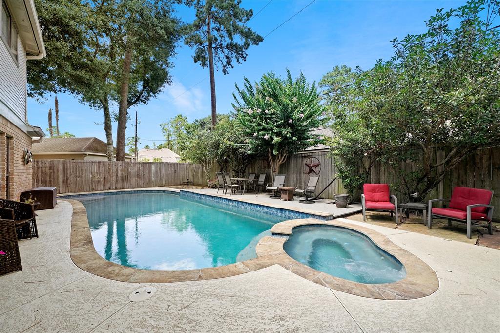 Welcome to your backyard oasis! Your private resort features a 41,000-gallon pool with an in-floor cleaning system, a hot tub with jetpack, and an automatic mosquito mister system that runs along the fence.