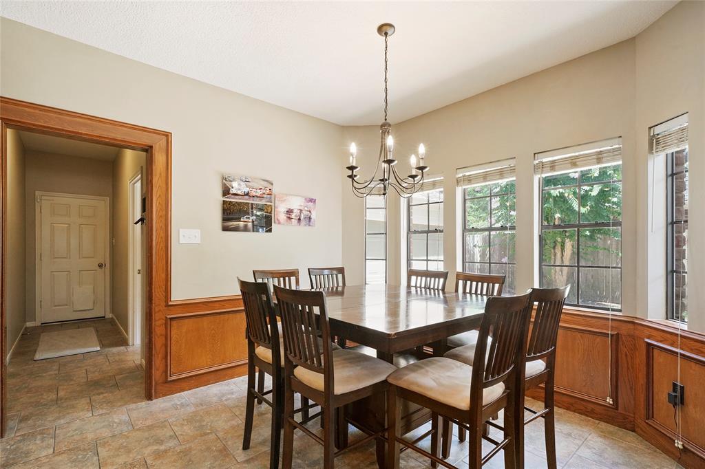 The breakfast area opening from the kitchen is warm, bright and amply sized.