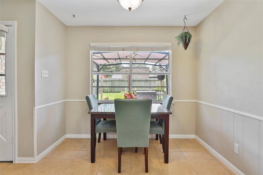 This breakfast room just off the kitchen brings in tons of light.