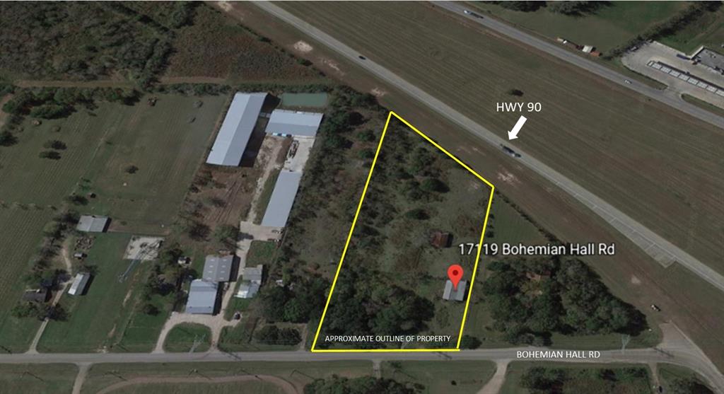 Beautiful 4.63 acres. Prime location on Bohemian Hall Rd and HWY 90. Mature trees with enough cleared space to meet your building needs. Home has No value. Property being sold as Land Value Only.