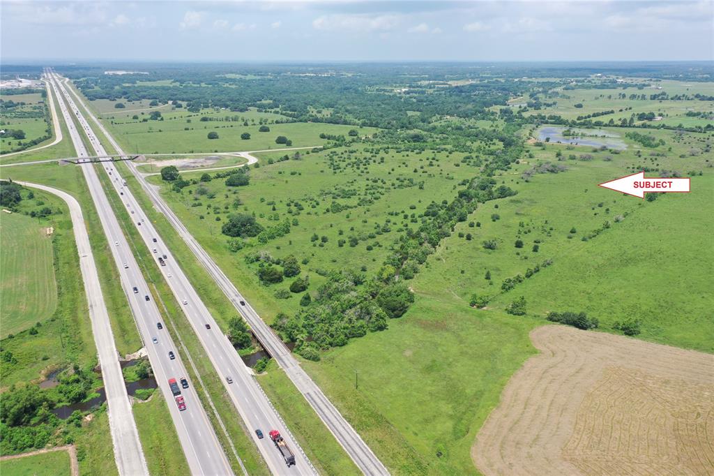 This 211.544-acre property is an excellent piece of commercial property located in Colorado County between Sealy and Columbus on the north side of I-10. Featuring 665 feet of frontage on the I-10 feeder road (Hwy-90) and 4,039 feet of frontage on Double Creek Road (a paved county road) providing great visibility from I-10.This property also features a 9+ acre lake and Church Creek meandering across one end of the property. Electricity and minerals are available.