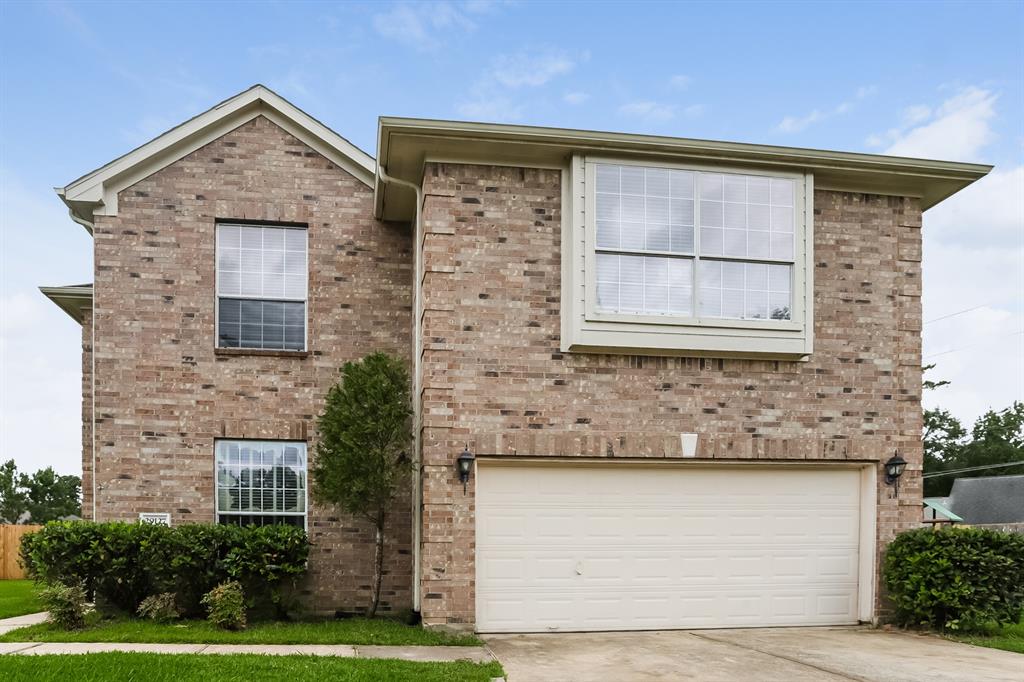 29127 Hidden Lake Court Magnolia, Texas Gorgeous home features a large family room with fireplace, dining area, large bedrooms, and lots of natural lighting throughout the home. Exterior includes a 2-car garage, large backyard and lush landscaping that surrounds the home.