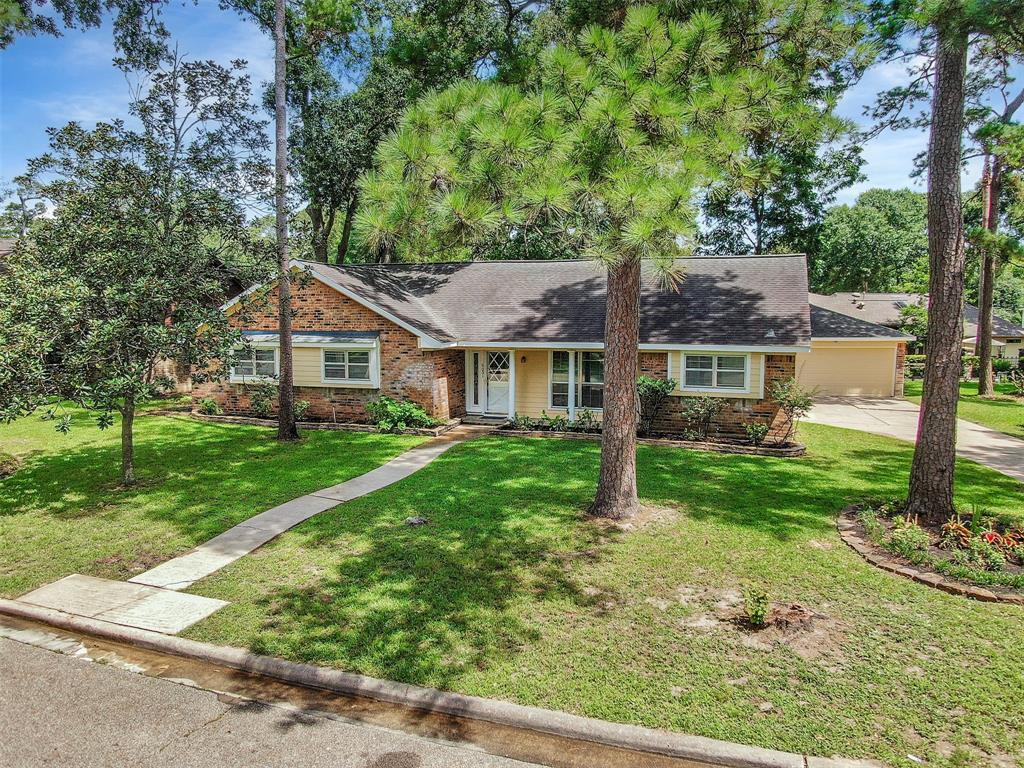 600 N Rivershire Drive Conroe, Texas Light and bright charming one story home. Fresh new paint inside and out. The floorplan incorporates 3 spacious bedrooms, 2 full baths, and a flex room that can be used as a study, formal dining, play area. Plenty of storage throughout. Large kitchen with breakfast area. Spacious living area that includes a wood burning fireplace to warm up by in the Winter. In house laundry room. Walk through the back door and be greeted by a large welcoming fully fenced back yard. Breeze way from home will lead to a double garage and an extra wide driveway. The neighborhood is blanketed in mature trees, a warm sense of community, only moments away from shops, eateries plus a quick access to I45/Woodlands/Houston area. The neighborhood offers a large pool, clubhouse and tennis courts. It is not unusual to see residents walking mornings and evenings. Come home to this cozy one story home.