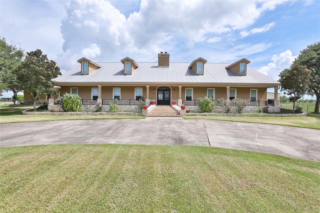 23+/-  OUT OF 39+/- ACRES INCLUDED IN SALE. TEXAS ELEGANCE best describes this gorgeous pipe fenced and xfenced Equestrian Estate!  Approx. 5300+ SF mini mansion, 6/7 bedrooms, 5 1/2 baths, 3 fireplaces and up to 6 car porte cochere. Pool w/waterfall, spa, covered/uncovered 38x66 patio + 38x45 palapa cover. Custom kitchen with elaborate Butler's pantry, granite counters, 10 ft Island with granite/custom cabinets; Primary Retreat features a fireplace, 3 walk-in closets; one with an island/custom built-ins, oversized tub and 10ft double shower.  3 secondary bedrooms feature ensuites, 2 others are connected with Jack/Jill bath. Media room or 7th bedroom. 12,000 SF barn with 2400 SF mezzanine, has 6 stalls plus 2 foaling stalls, bathroom, tack room, 100x200 outside arena, 100x2150 runway or additional irrigated pasture. Pre-approval letter/ID required prior to scheduling a Tour! VERIFY ALL DIMENSIONS and SF.