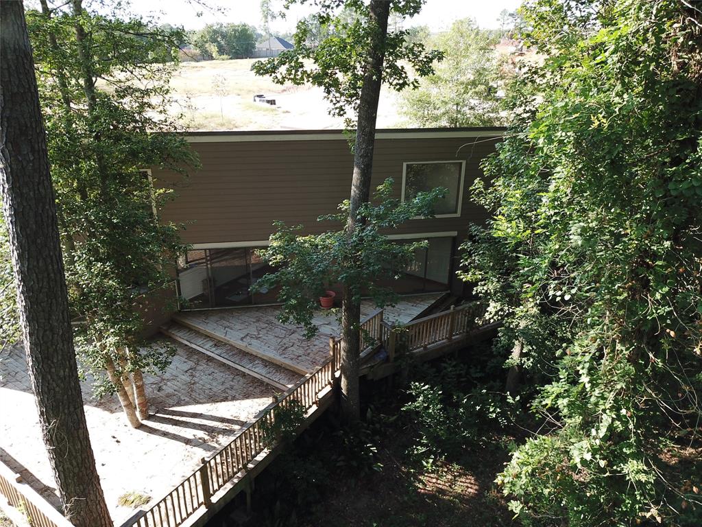 1914 1 Longmire Road, Conroe, Texas 77304, 4 Bedrooms Bedrooms, 4 Rooms Rooms,3 BathroomsBathrooms,Single-family,For Sale,Longmire,70908431