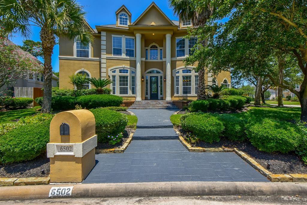 6502 Kodes Clay Court Spring, Texas Nestled in a gated community of spacious custom built dwellings, this gorgeous Mediterranean stucco home encompasses 5,724 square feet of spacious luxury living. Stunning interior views, accentuated with a plethora of built in features, high ceilings and towering windows provide a well deserved feeling of affluence. Showcase your culinary cuisines in this kitchen designed from the influence of local chefs - granite counter tops, double ovens, commercial refrigeration, island cook tops. Experience a relaxing evening routine in the master bathroom with separate sinks, oversized shower and a custom contemporary free standing bathtub. Your home backs up to a green belt which allows for a relaxing, private enjoyment of your oversized back yard living area, complete with a covered outdoor kitchen. Walking distance to highly rated Klien ISD schools, museum, library, police station/court house, parks, hike and bike trails, and local cuisine. This is a very active swimming and tennis community.