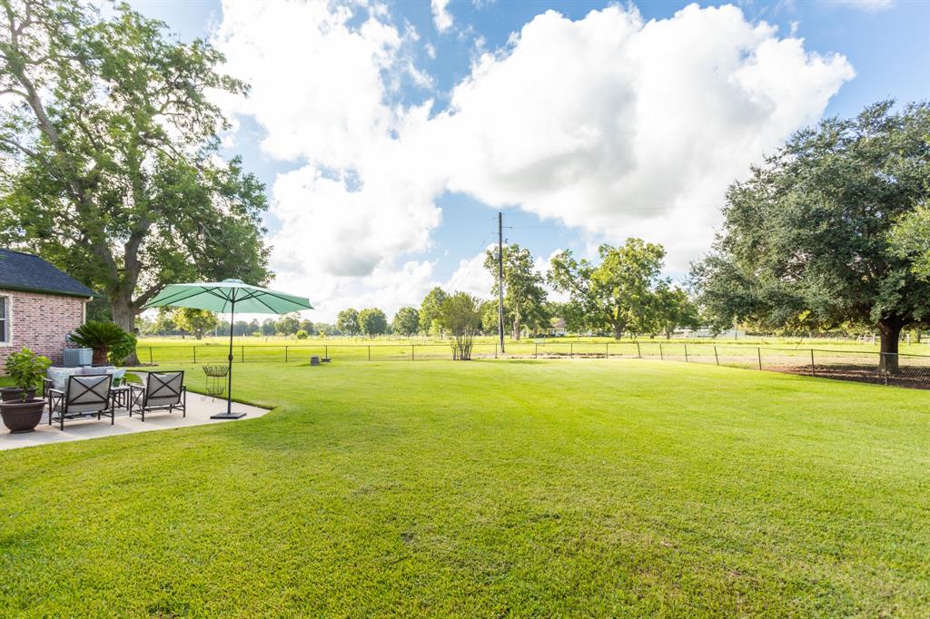6935 2 Bois D Arc Lane, Fulshear, Texas 77406, 3 Bedrooms Bedrooms, 10 Rooms Rooms,3 BathroomsBathrooms,Country Homes/acreage,For Sale,Bois D Arc,76352831