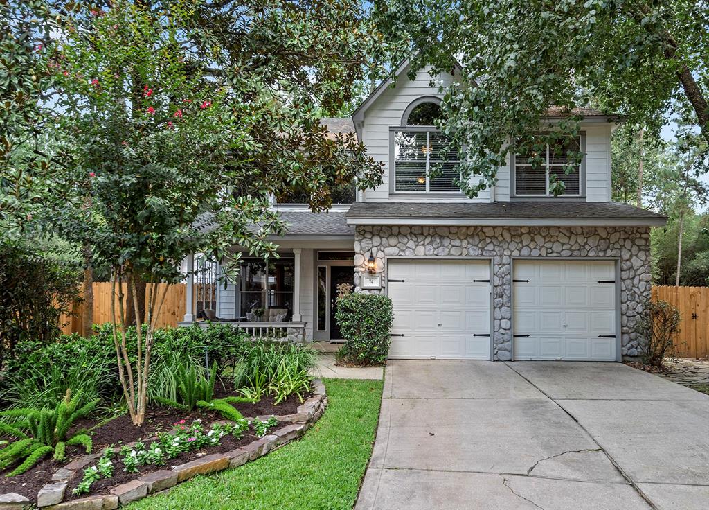 74 Winter Wheat Place The Woodlands, Texas Adorable Lifeforms home located on huge cul-de-sac street which backs to an easement with views of a quiet pond. Home has been updated and is move in ready with two primary suites one up and one down. The home features a two story living/dining room when you enter with hardwoods. The kitchen has been remodeled with replaced white cabinets, granite, stainless appliances and small breakfast room. Living area open to kitchen. Full guest bath with shower down plus the amazing downstairs primary added a few years ago with beamed ceiling, built-ins and executive bath with large walk in shower and double sinks. Upstairs enjoy an additional primary bed/bath with covered patio overlooking the private backyard and views of the lake the bath features a garden tub/ sep shower w/double sinks. Two additional bedrooms share a bath. This home has been so well cared for and is ready for its new owner. Outdoor spa to stay.