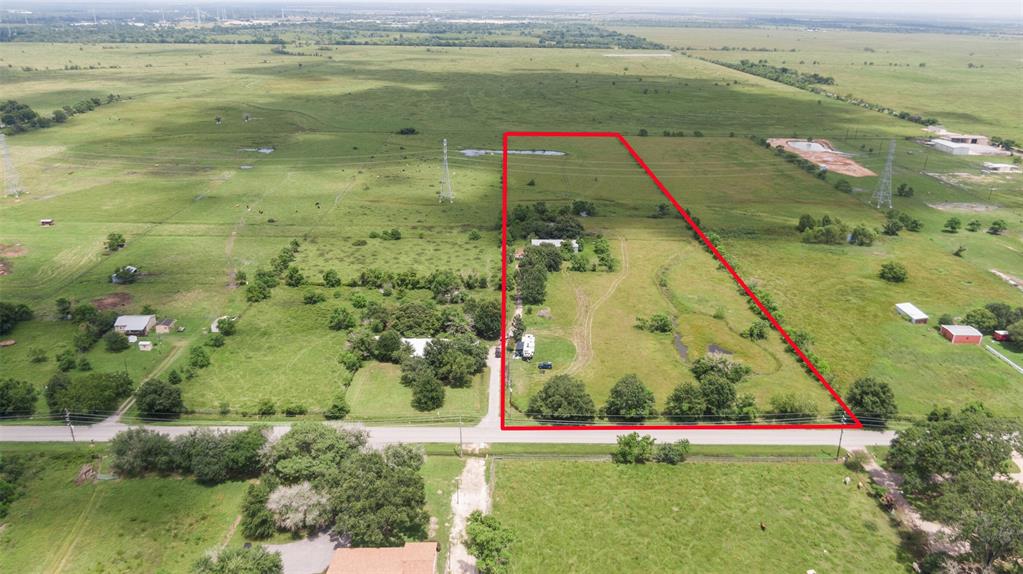 16610 Warren Ranch Road Hockley, Texas 10 acres already cleared and unrestricted. With approximately 290 ft of road frontage, this property has endless possibilities for business, residential development, investment, hobby farm, ranching etc.... property is currently pasture land, AG exempt and used to run cattle and hay. Pond is fed year round. Barndominium was damaged in the freeze and needs to be repaired. 250' foot water well provides water even in the most dry seasons. Would be excellent as a personal residence, office, or clear it out and use as a shop. Also available is the neighboring 10 acres, if one piece just isn't enough. Call listing agent with any questions. Please contact the listing agent for your private showing.