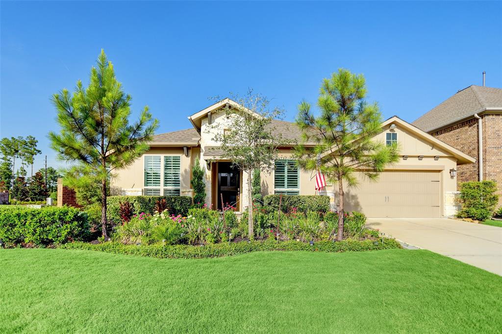 28223 Green Meadow Way Spring, Texas Large Perry Home - Mahogany front door. Brick and stone elevation. Entry and extended entry with 13-foot ceiling. Library with French doors and formal dining room set at entry, both rooms with hardwood flooring. Huge kitchen with wrap-around countertops and plenty of counter-space & storage. Including a middle island with a walk-in pantry and butler's pantry. Family room with ceramic tile floor features a 14-foot ceiling and a wall of windows. Private master suite with another wall of windows. Double door entry to master bath with dual vanities, two walk-in closets, garden tub, separate glass enclosed shower. Spacious game room (or media room) just off the family room. Large utility room with plenty of storage. Extended covered backyard patio with ceiling fan and gas connection for your dream outdoor kitchen. Tandem three-car garage with plenty of space and mud room as soon as you enter the home from the garage.