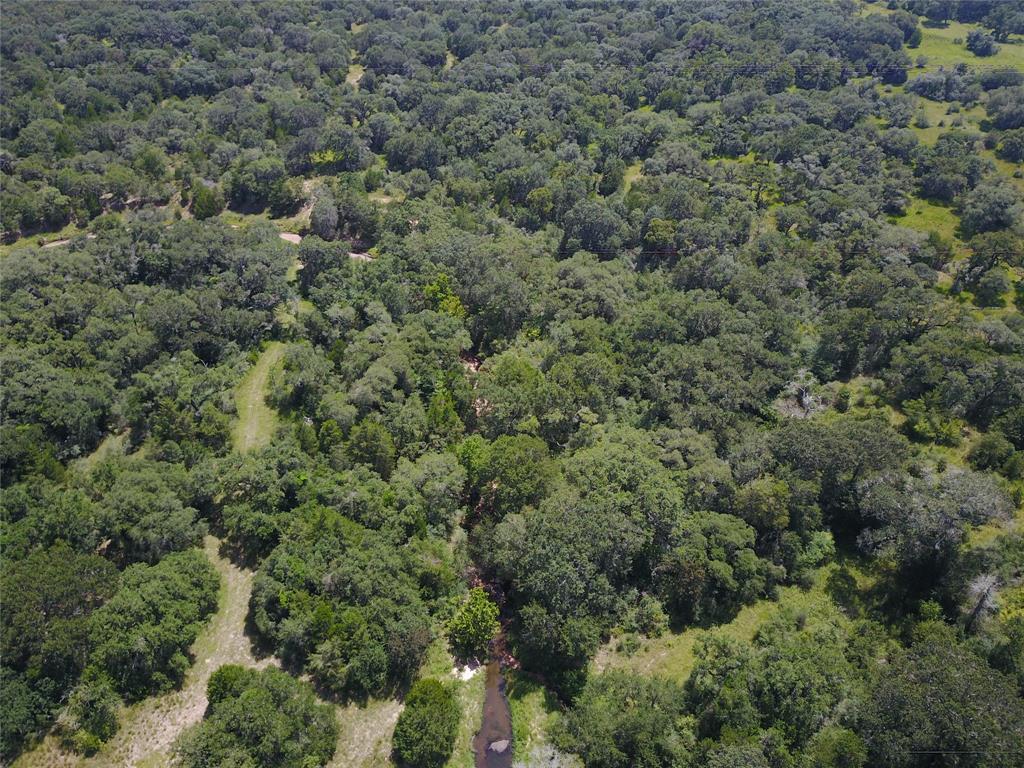 0000 TBD Sheridan, Texas Minutes from Splashway Water Park in Sheridan, TX awaits your private getaway in the woods. Majestic Oaks are plentiful on this 24.84 acre parcel. Dry creeks through the property invite plenty of Wildlife. Granted easement makes it easy to get to this property. This property will need a culvert over the creek for vehicle access. Beautiful open pastures provide great opportunities to build your country home, hunting cabin, raise livestock or just enjoy as it is. Relax in the fresh country air as you take-in beautiful Texas sunsets! Make your appointment today and allow us to give you a tour of the property, you will be glad you did!