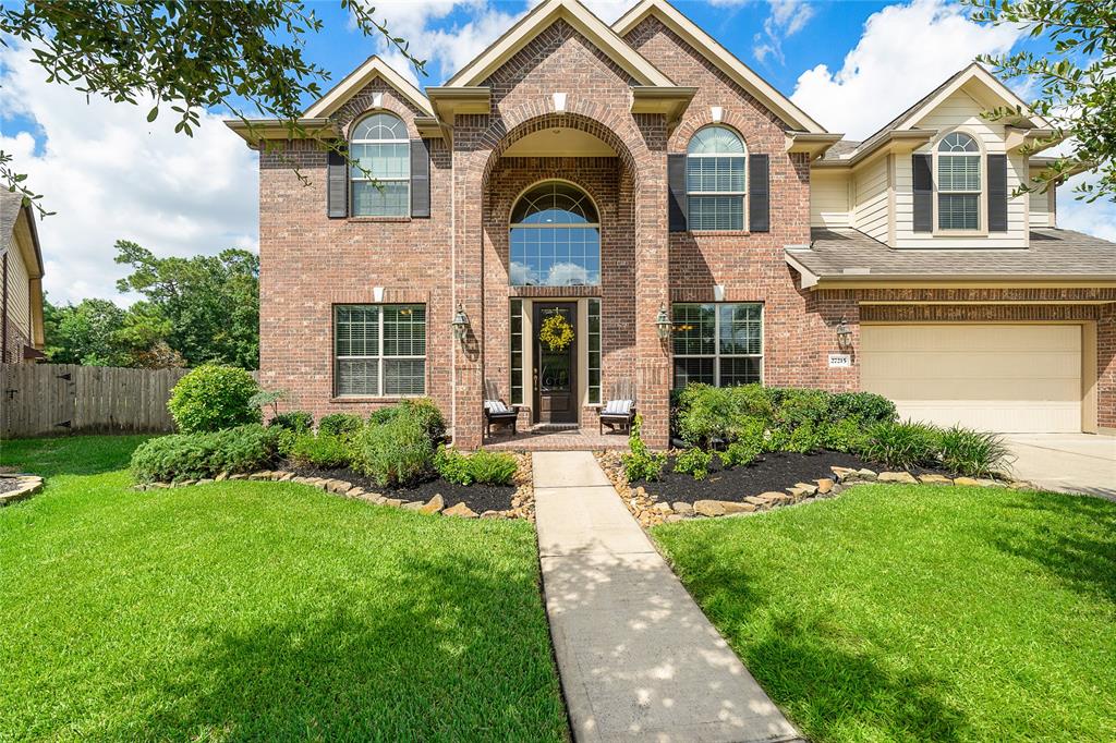 27215 Adrian Hills Lane Spring, Texas RARE FIND! Beautiful home situated on one of the largest lots in sought-after Spring Trails. Beautiful home offers everything you are looking for: soaring ceilings, light bright open floor plan w/breakfast area & kitchen opening to family room w/gas fireplace. Spacious kitchen is perfect for "home chef" boasting granite countertops, ample cabinets; large laundry room w/built-in shelving & washer & dryer remain; primary ensuite downstairs w/large walk-in closet w/built-in shelving, separate shower/whirlpool tub; 3 spacious secondary bedrooms up, one w/Jack N Jill bath; media/gameroom up; and abundance storage w/floored attic space & hidden niches. Then the backyard outdoor retreat w/amazing pool w/waterfall & spa, firepit, extended patios, pergola, and privacy backing to 4+ acres of green space & still plenty of yard left to play! Shopping nearby, zoned for great schools & EZ access to I-45,Grand & Hardy Toll.