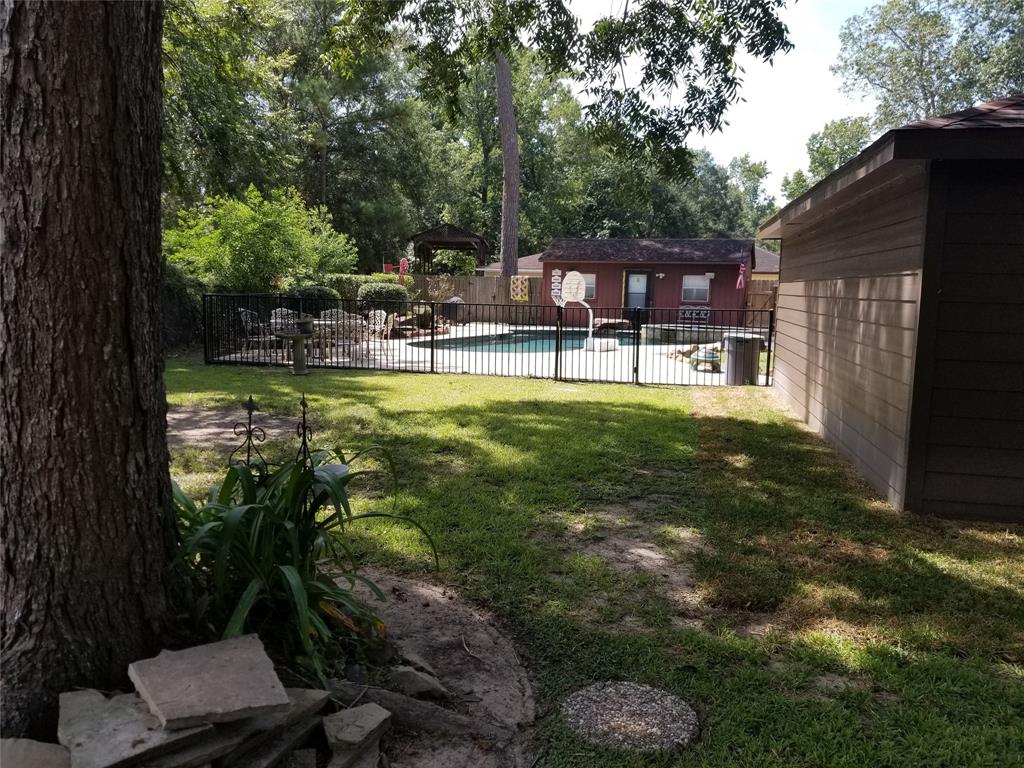2334 1 Whispering Pines Street, Roman Forest, Texas 77357, 4 Bedrooms Bedrooms, 10 Rooms Rooms,3 BathroomsBathrooms,Single-family,For Sale,Whispering Pines,89642354