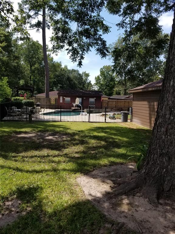 2334 1 Whispering Pines Street, Roman Forest, Texas 77357, 4 Bedrooms Bedrooms, 10 Rooms Rooms,3 BathroomsBathrooms,Single-family,For Sale,Whispering Pines,89642354
