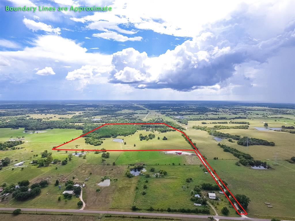 TBD County Rd 313 Navasota, Texas Resting in the hills of southern Grimes County, this exceptional 98-acre tract offers diverse landscapes from your beautiful homesite on the prairie to your pine thicket and outback for a prime wildlife habitat. The winding dry creek bed lined with moss and stately oaks and the two stocked ponds add to the property’s character. Located 9 miles north of the new SH 249 extension, the property offers paved CR 313 access, public water, MidSouth Synergy electric and fiber optic internet, boundary fencing and cross-fencing for rotational grazing and recreational enjoyment. The old Kopecky homestead still stands at the heart of the property offering insight to the history of the family farm. The property boasts years of family history and love offering the best of all worlds to a Buyer looking for a place to establish roots in the country 45 minutes from The Woodlands, Houston, and College Station.