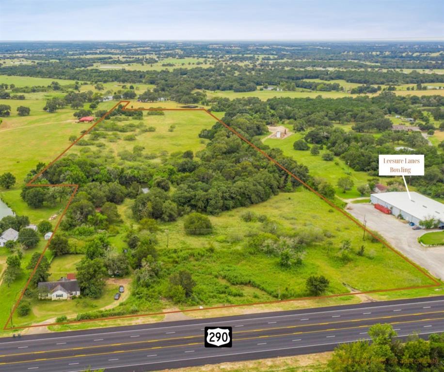 2235 W HWY 290 Giddings, Texas Enjoy the best of all worlds with this 24.99 AC property located outside city limits off Hwy 290! Parts of the property are zoned commercial, parts residential, and the rest farm and ranch, allowing for plenty of options for how to take advantage of the land. Three entrances off of 290 provide a great start for commercial development, a home that could serve as a personal residence or income-producing rental, an Ag Exemption is in place for those looking for agricultural property, and county water and Bluebonnet electricity are available to serve any usage.