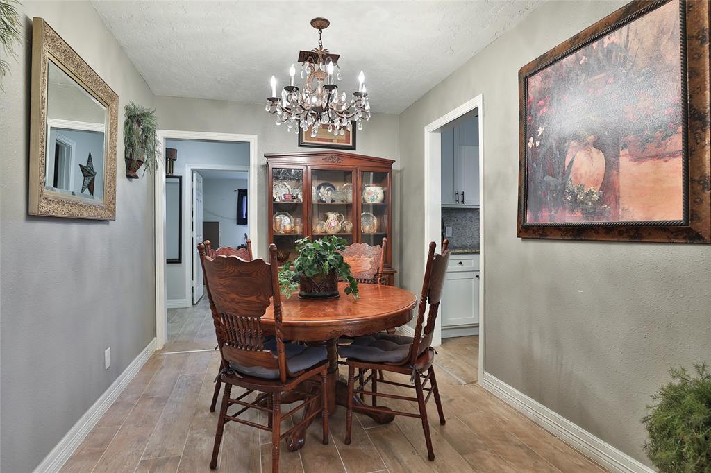 Sweet dining room just off of the kitchen makes for a beautiful focal point upon entering the home through the from the door.