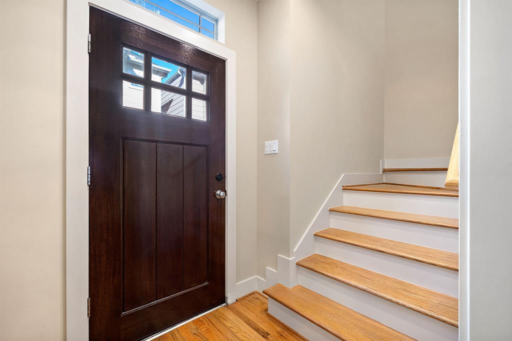 Entry door and stairs to main living space.
