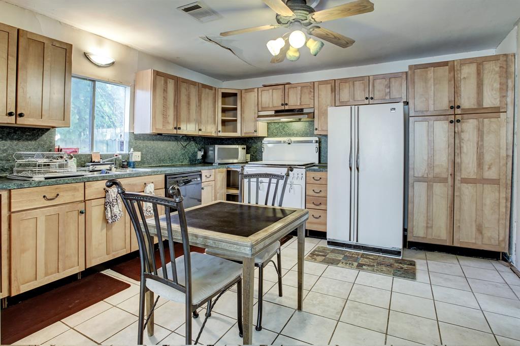 Interior exclusions include the kitchen cabinets, the stove/oven (range), dishwasher, ceiling fans, inside doors and shower heads.