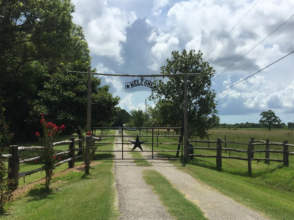 2325/2323 Westward Avenue La Marque, Texas Urban retreat and country living on 12 beautifully fenced acres that include a barndominium with 13 income-producing horse stalls, charming cottage that can be relocated, 2 paddocks, a large lighted arena, outbuildings, dog kennels and enough land to have even more of your dreams in an idyllic setting. Just 1/8 mile west of I-45S off a county road with CITY WATER & SEWER. CAN BE SUBDIVIDED. The stall and cottage rentals produce steady monthly income with even greater potential. CURRENT AG EXEMPTION. Other income producing potential: cottage rental, grazing land, hay baling, farming and crops. Close to Houston, Clear Lake and Galveston. VIEW PROPERTY on YOUTUBE virtual tour link provided on icon above or https://youtu.be/bJ6Vzc_XM1k. More cottage and property specifics are included on photos and as an attachment.