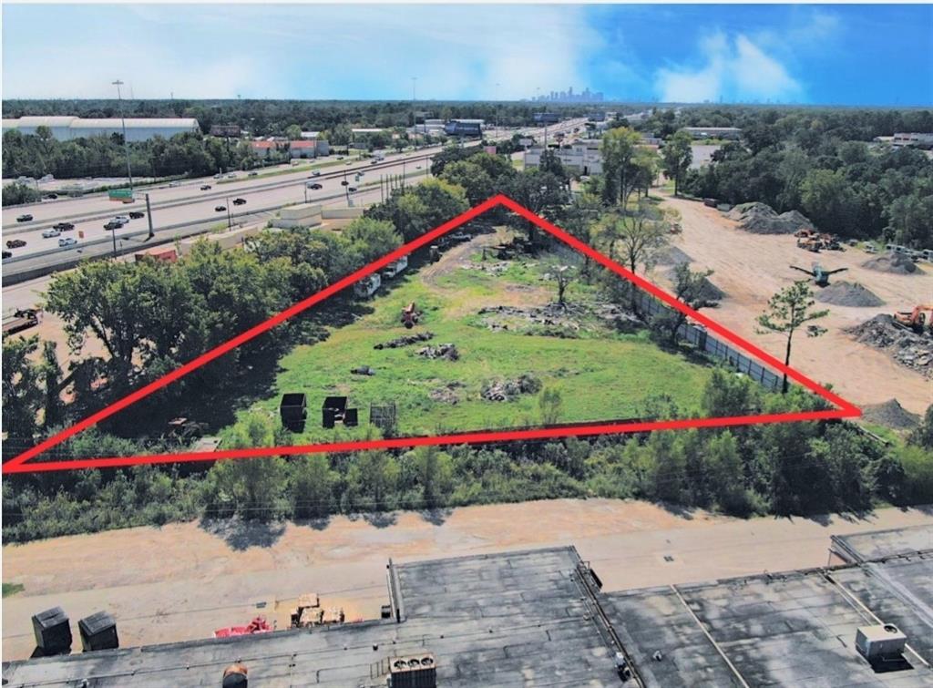 Prime location on Eastex Fwy service road.  Lot is cleared and fully fenced.  This property is ideal for commercial  use.  Located  behind the orange door and next to Eastex Performance Muffler.