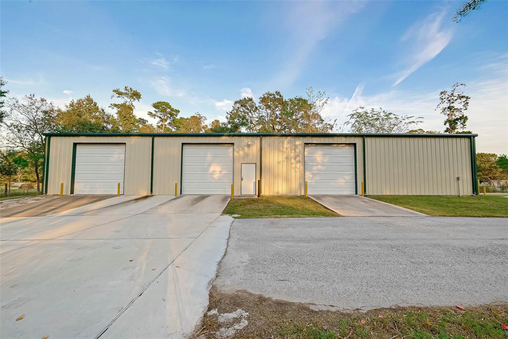"Barndominium" Perfect set up for business use or residential use. Move in ready with 2 driveways, 4 roll up doors and plenty of space for parking.