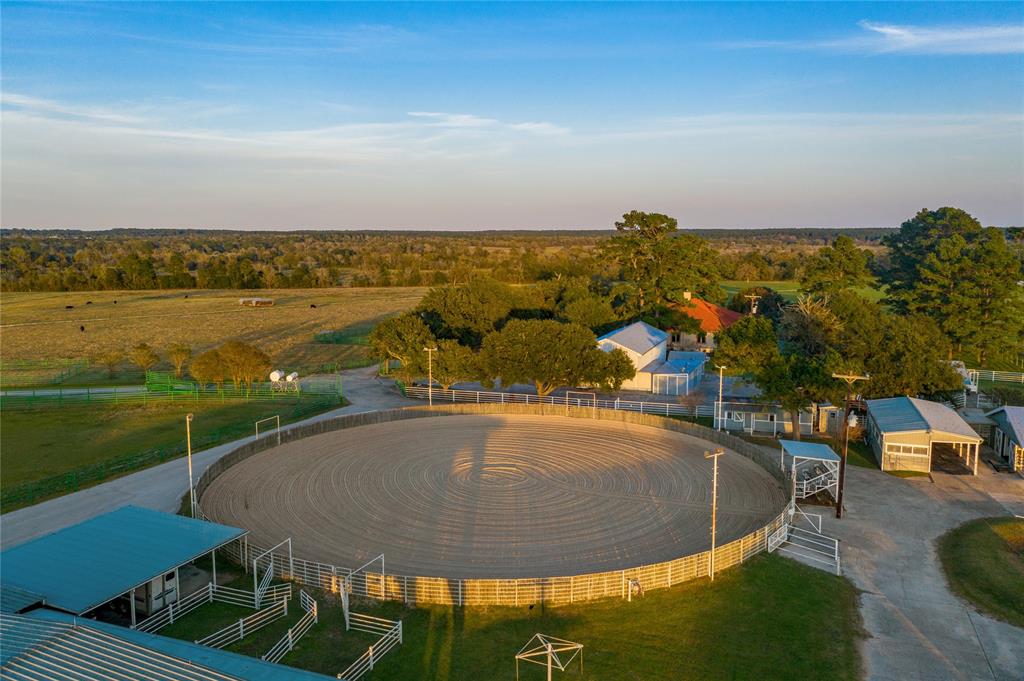 Welcome to the Diamond Spur Ranch. This premier equestrian and cattle ranch is ideally located in Grimes County between Houston and College Station. With its gently rolling pastures, lake, ponds, state of the art equestrian facilities and luxury home, the Diamond Spur Ranch is sure to impress the most discerning buyer. With a covered and open arena, multiple stables & paddocks, vet and breeding station, the ranch is capable of both large scale or hobby horse operations. Stalls are finished with fans, automatic water troughs and fly spray systems. An impressive 6.5 miles of pipe fencing was used throughout the facilities. The recently constructed open concept owner’s residence is complete with luxury finishes, soaring ceilings, stainless steel appliances and a backyard pool that overlooks the ranch landscape. Four additional guest homes are perfect for managers, trainers or overnight guests. Within an hour from Houston & IAH, the ranch is well suited for both full or part-time living.
