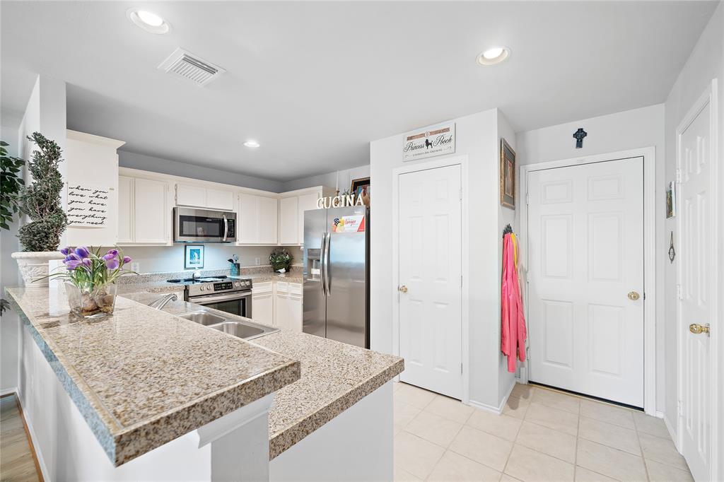 Your open concept kitchen includes a set of all brand new appliances and a large pantry.
