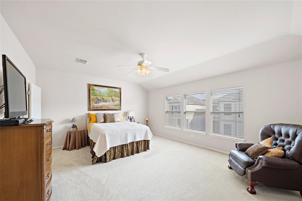 Vaulted ceilings in the primary suite and plenty of natural light.