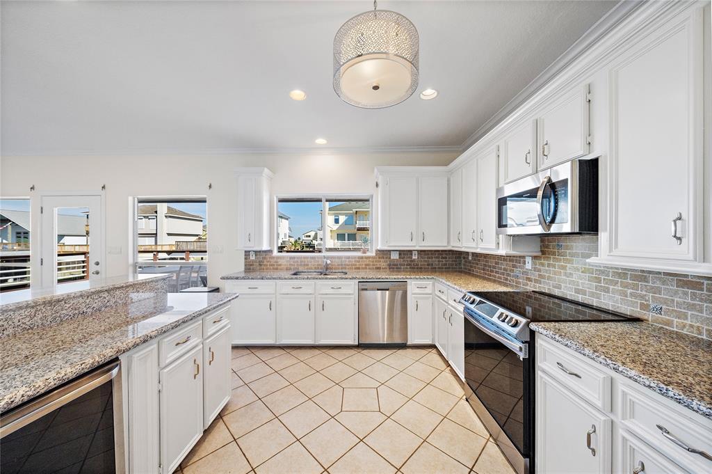 410 1 Westerly Drive, Tiki Island, Texas 77554, 3 Bedrooms Bedrooms, 6 Rooms Rooms,2 BathroomsBathrooms,Single-family,For Sale,Westerly,73393124